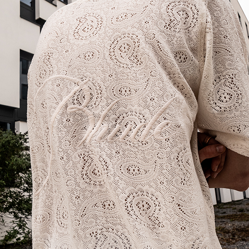 Rhude - luxury streetwear brand Banner Image of a detailed shirt closeup