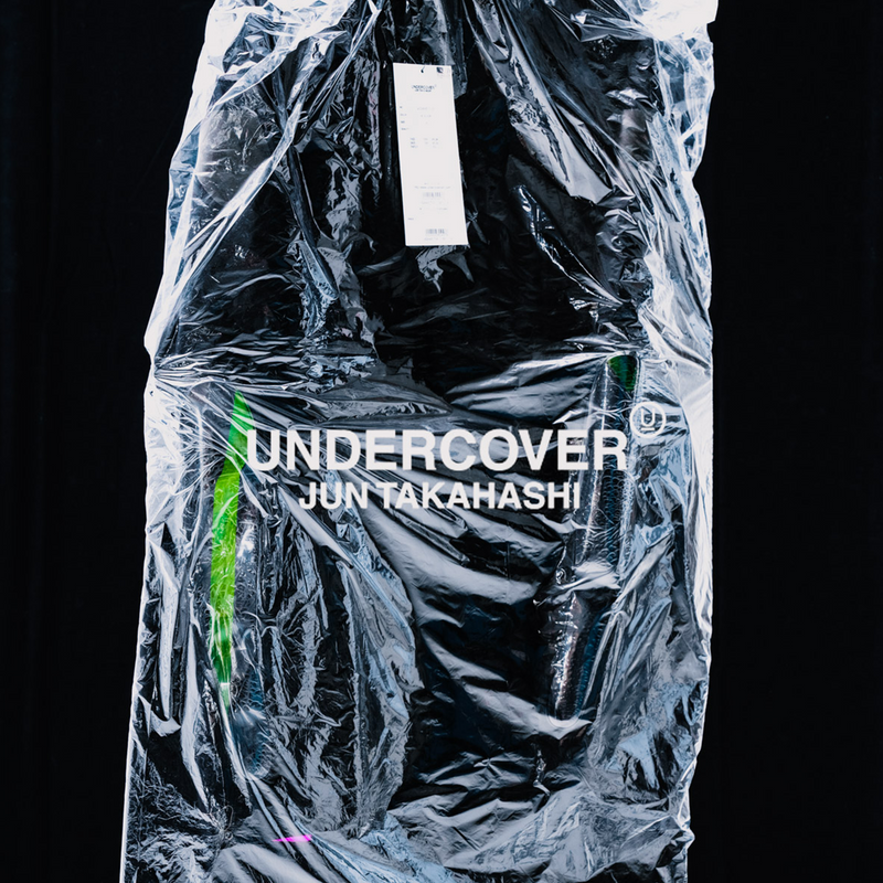 Undercover brand by Jun Takahashi banner image of packaging