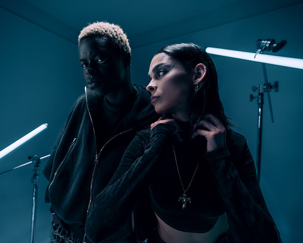 Close up of a man and woman in Gate x Cupra capsule collection clothing