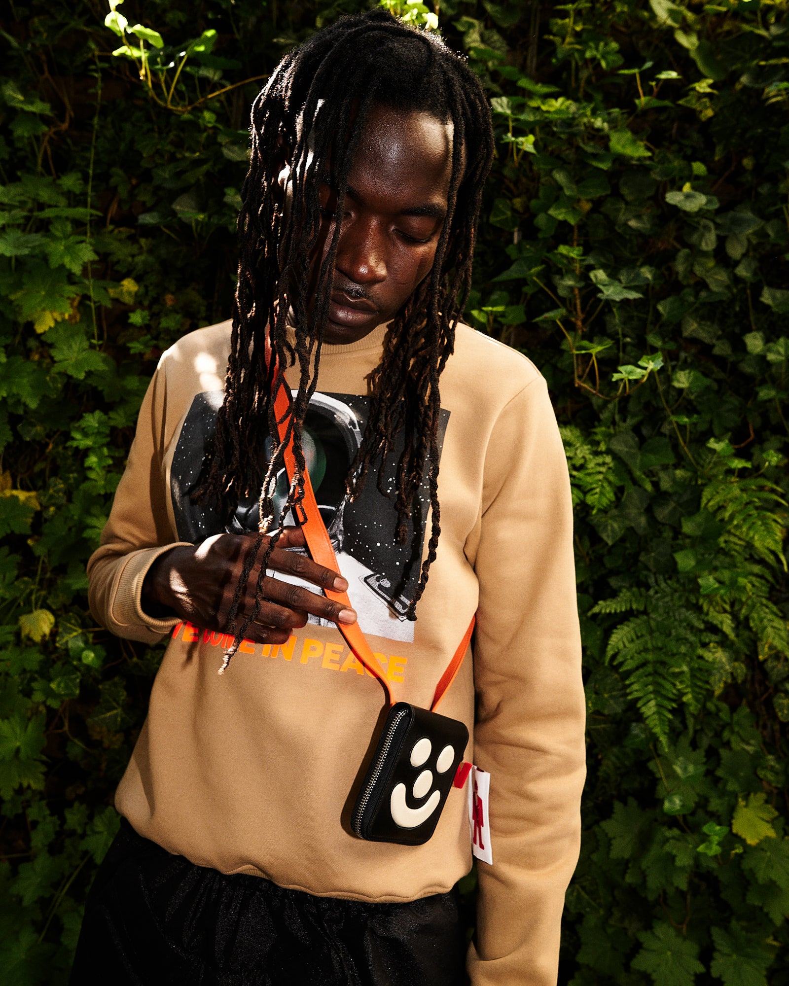 Walter Van Beirendonck Ghost Wallet Comb. I Black Wallets 9012 / Comb. I Black On Model Front View | GATE
