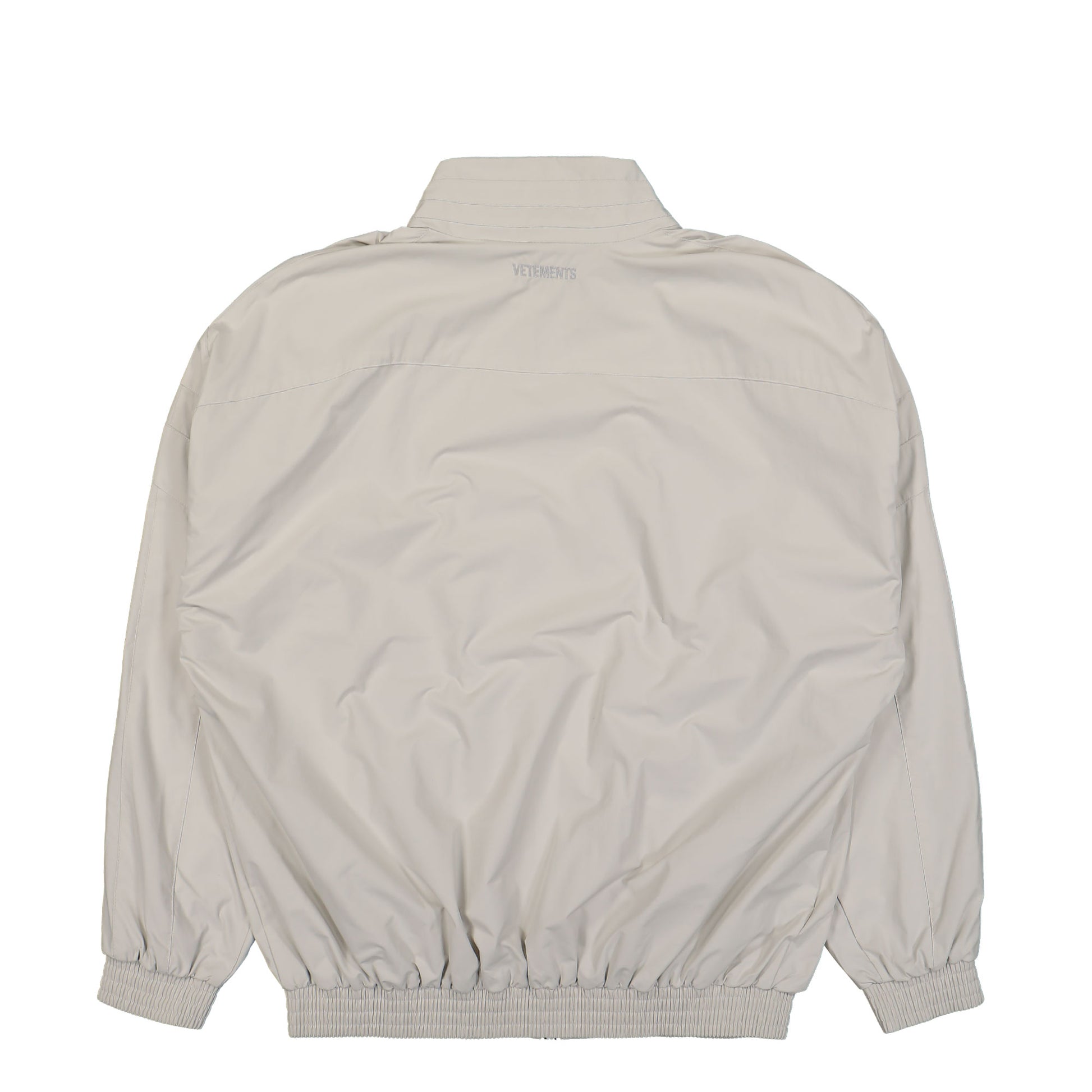 VETEMENTS Oval Logo Tracksuit Jacket Beige Detail view 2 | Gate