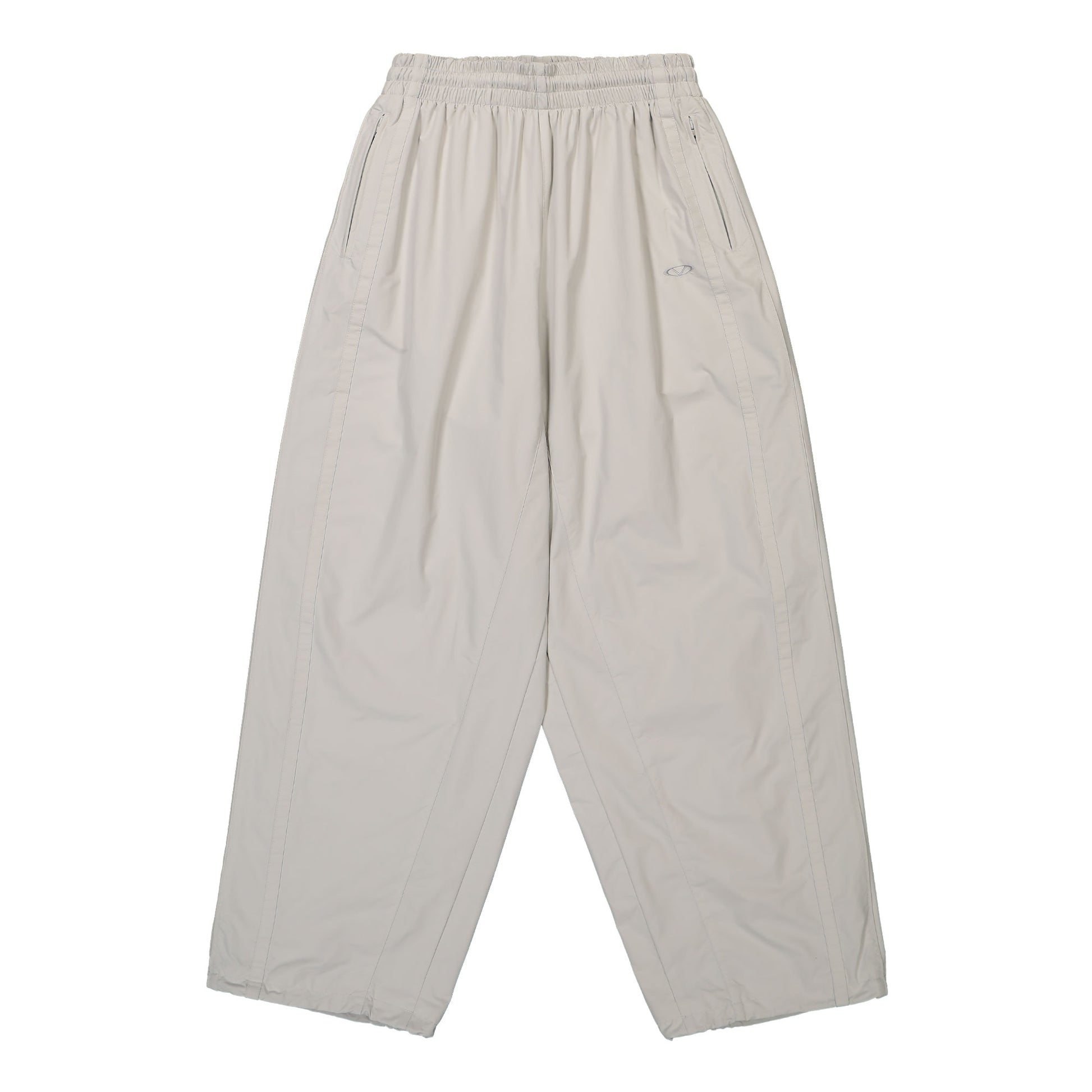 VETEMENTS Oval Logo Tracksuit Pants Beige Detail view 1 | Gate
