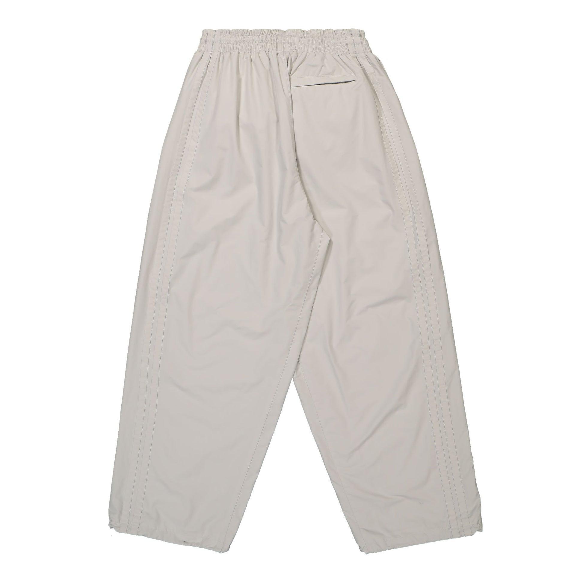 VETEMENTS Oval Logo Tracksuit Pants Beige Detail view 2 | Gate
