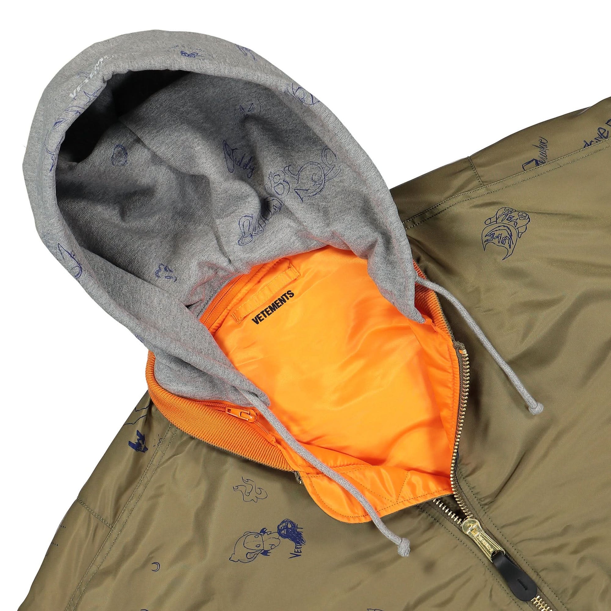 VETEMENTS Scribbled Hooded Bomber Jacket Olive Detail view 4 | Gate