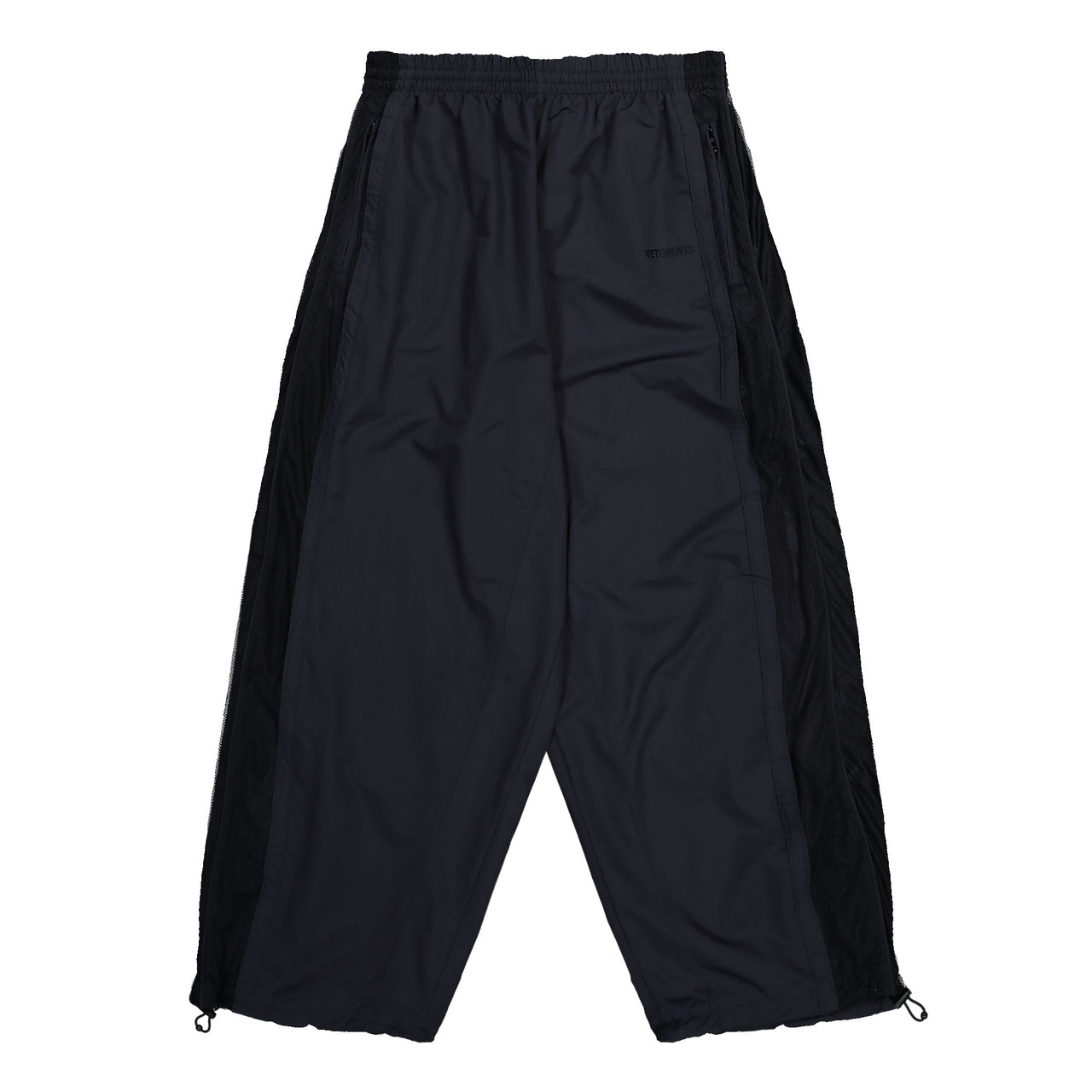 VETEMENTS 50/50 Mesh Pannel Tracksuit Pants Black Sweat & Track Pants UH76GP700B Detail View 1 | GATE