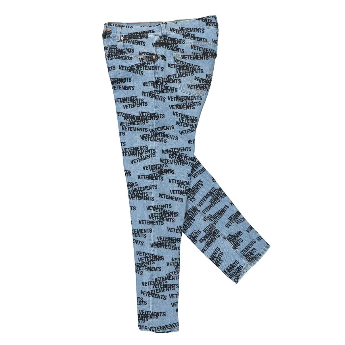 VETEMENTS Stamped Logo Straight Leg Denim Jeans Blue Detail view 4 | Gate