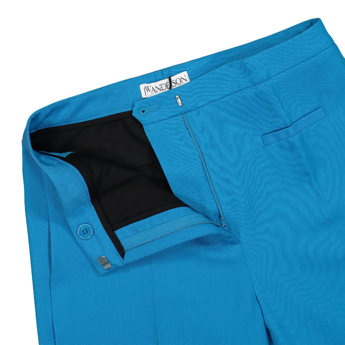 JW Anderson Slim Leg Trousers Blue Detail view 4 | Gate