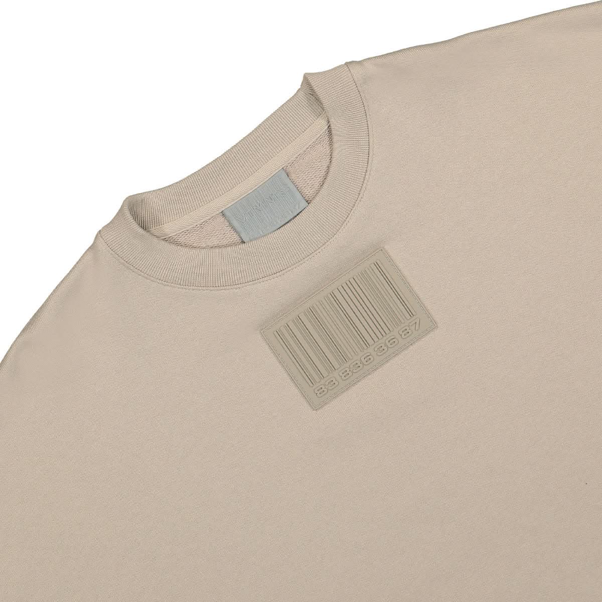 VTMNTS Big Rubber Patch Cropped Sweatshirt Beige Detail view 3 | Gate