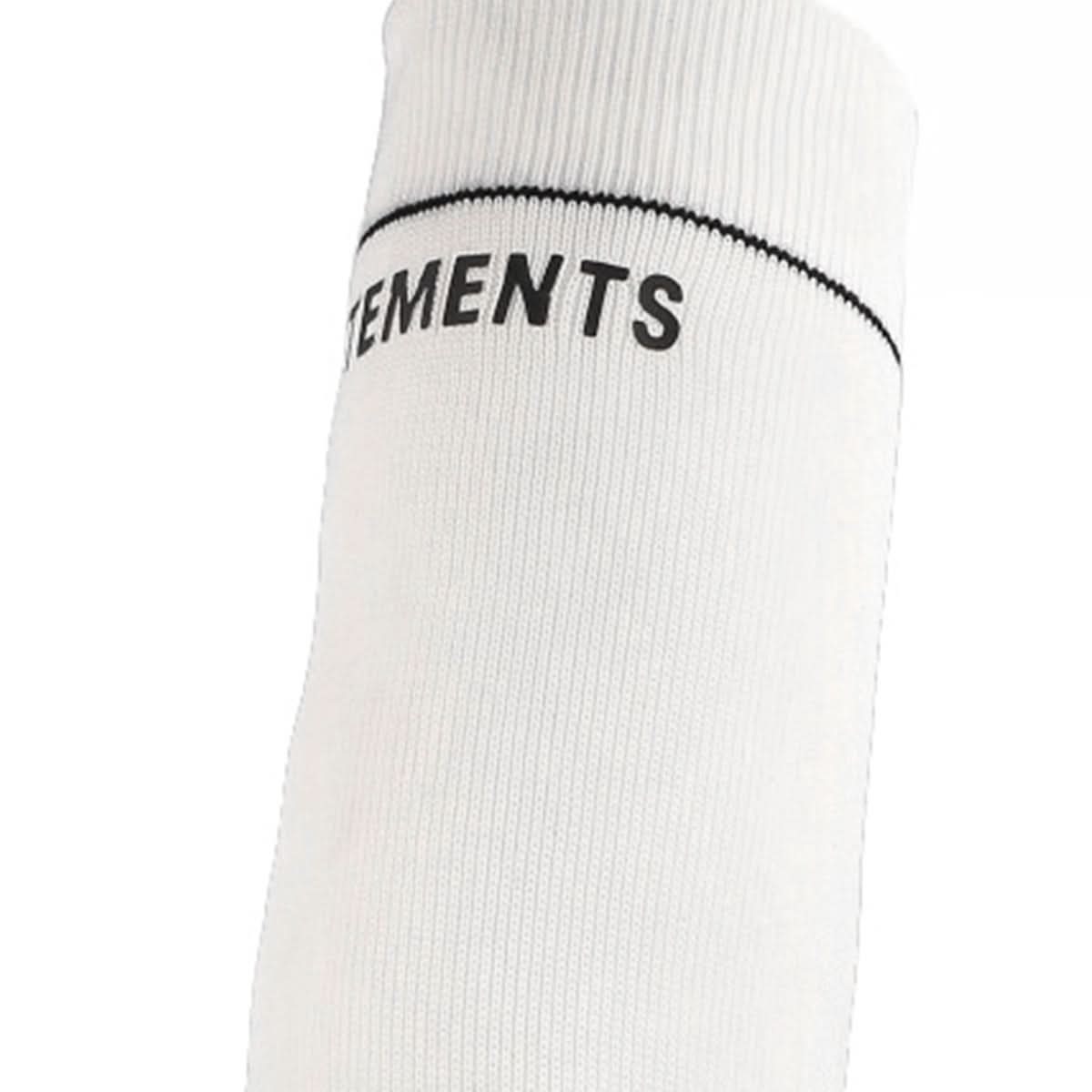 VETEMENTS Lighter Heel Ankle Sock Boots White Heels Detail view 5 | Gate