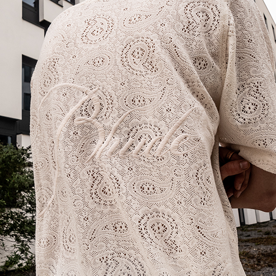 Rhude - luxury streetwear brand Banner Image of a detailed shirt closeup