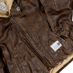 Maison Mihara Yasuhiro Extended Placket Hood Coated Jacket Brown Jackets A15BL072 Detail View 4 | GATE
