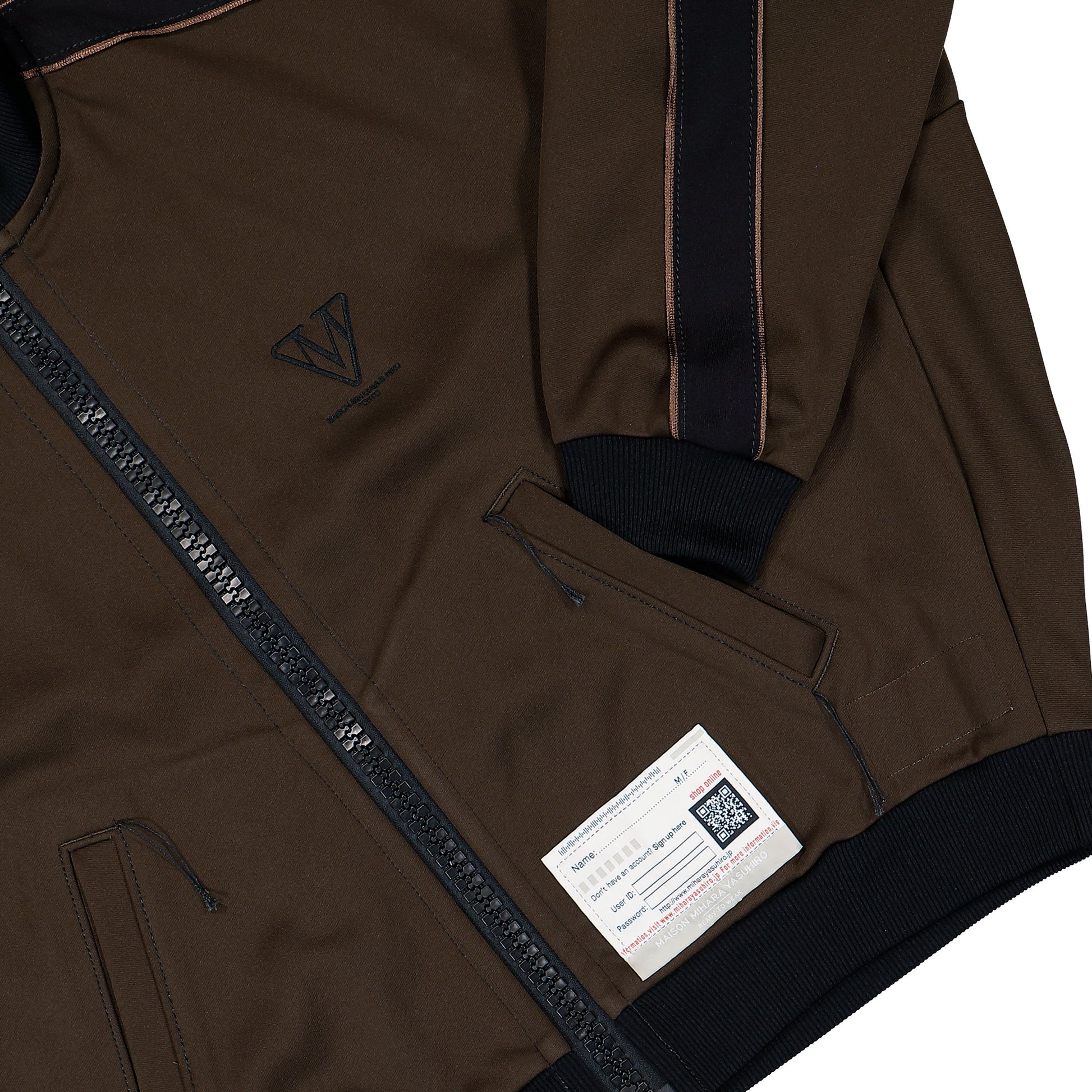 Maison Mihara Yasuhiro Amateur Sewn Track Jacket Brown Tracksuit Tops A16JK581 Detail View 4 | GATE
