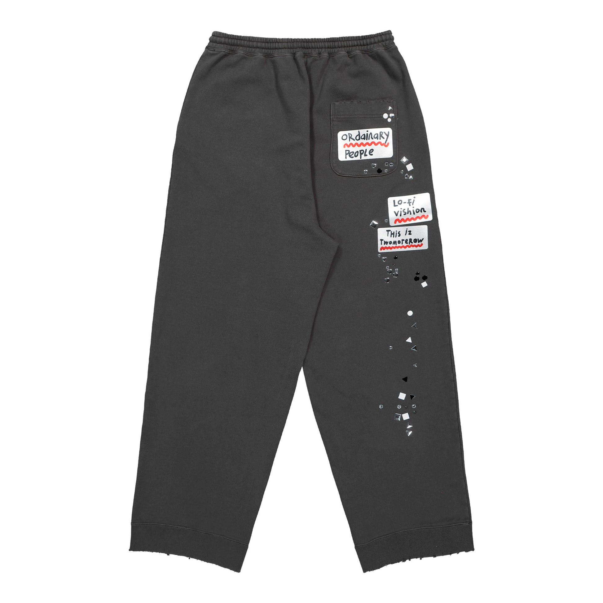 Maison Mihara Yasuhiro Embellished Sticker Pant Black sweat & Track Pants A16PT552 Detail View 2 | GATE
