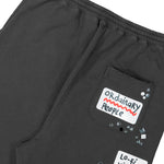 Maison Mihara Yasuhiro Embellished Sticker Pant Black sweat & Track Pants A16PT552 Detail View 5 | GATE
