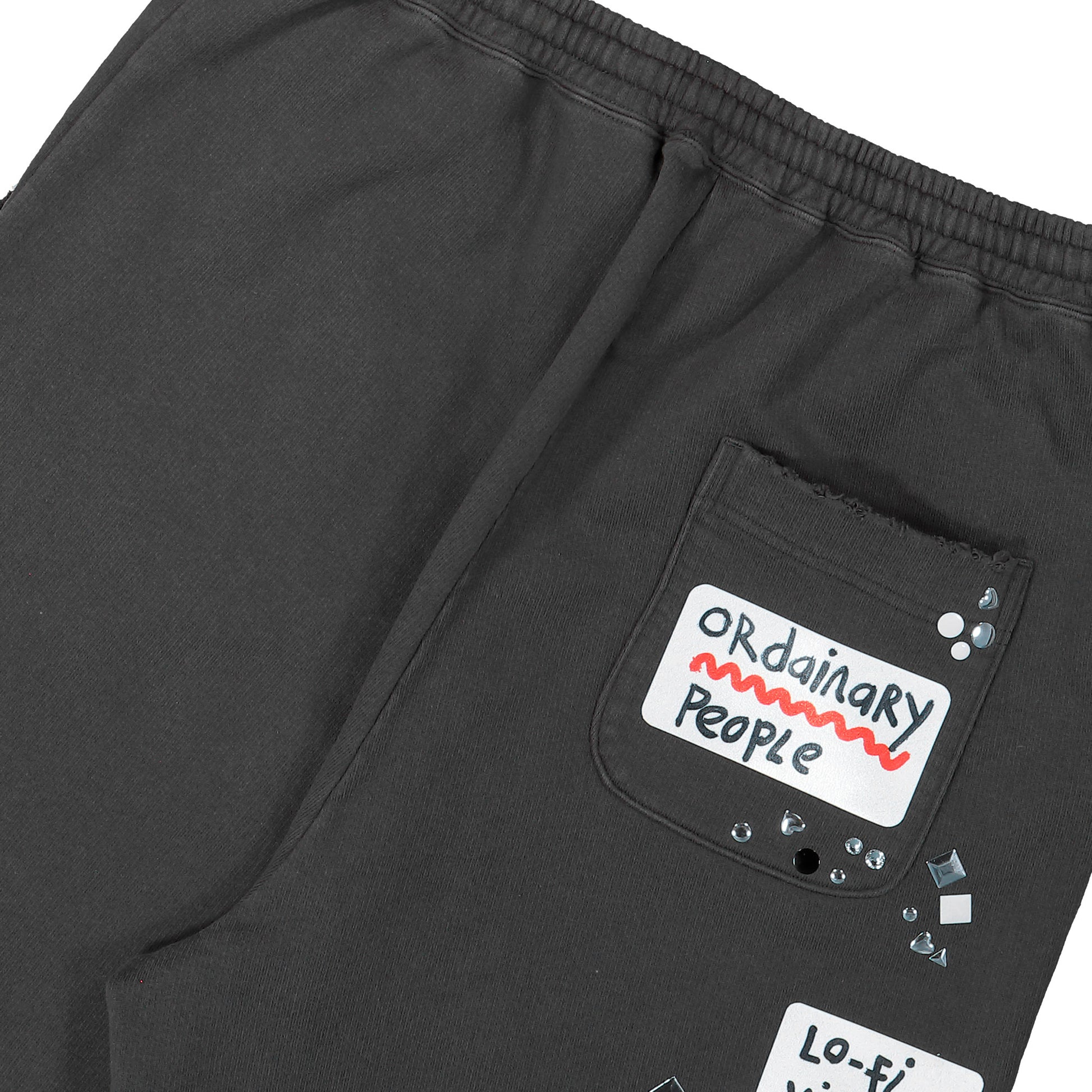 Maison Mihara Yasuhiro Embellished Sticker Pant Black sweat & Track Pants A16PT552 Detail View 5 | GATE
