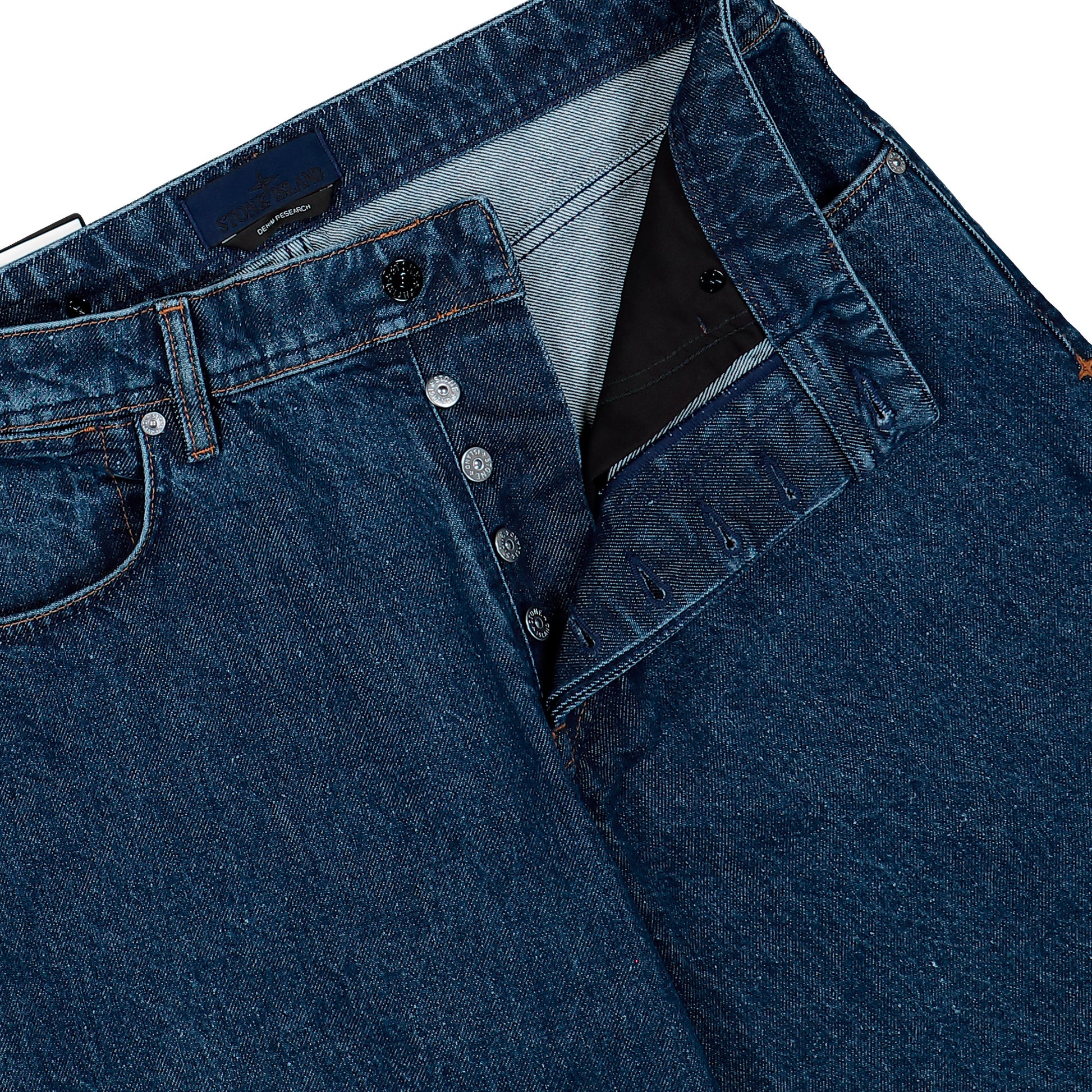 Stone Island Loose-Fit Grainy Wash Indigo Denim Trousers Blue Medium Wash Denim L2S14J100006-S0J34 VJ202 Detail View 4 | GATE