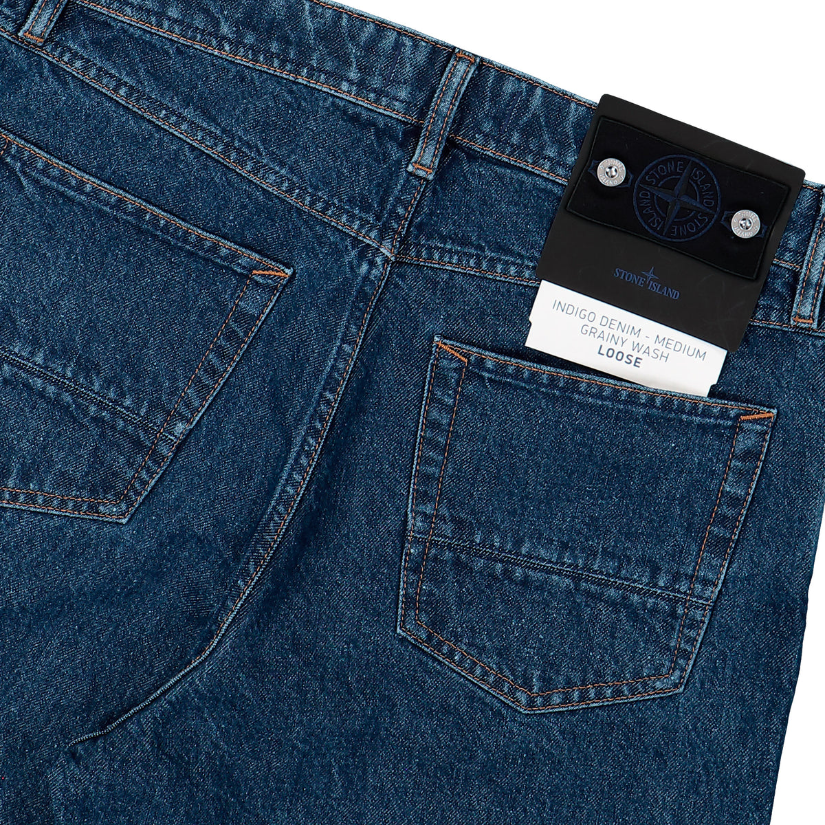 Stone Island Loose-Fit Grainy Wash Indigo Denim Trousers Blue Medium Wash Denim L2S14J100006-S0J34 VJ202 Detail View 5 | GATE