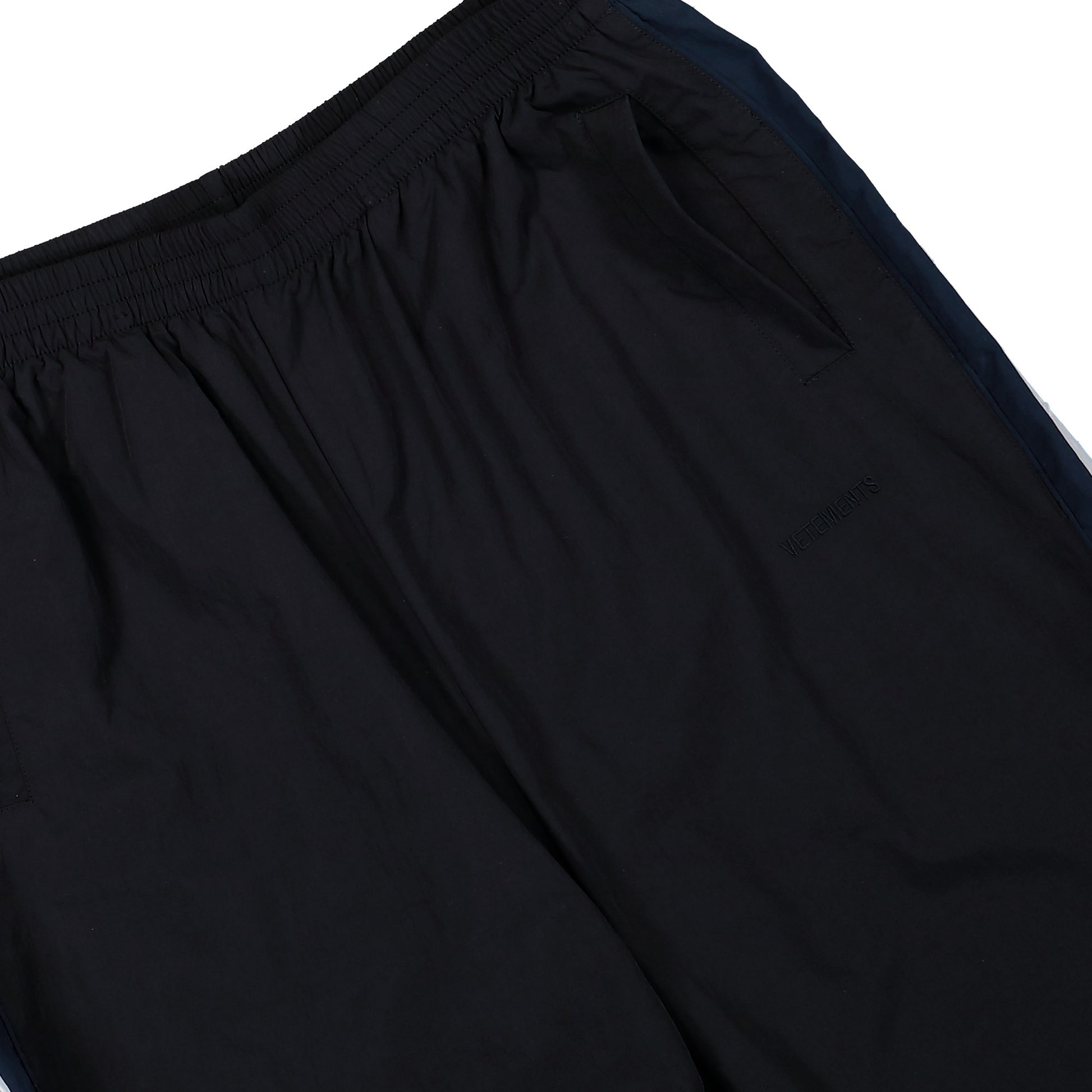 VETEMENTS Taped Tracksuit Pants Black / Blue Sweat & Track Pants ME76GP126B Detail View 4 | GATE
