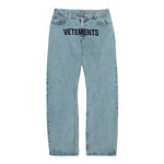 VETEMENTS Embroidered Logo O-Leg Jeans Vintage Blue Denim MH27DJ079LB Detail View 1 | GATE