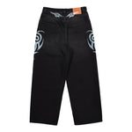 VETEMENTS Graffiti Tribal Baggy Jeans Vintage Black Denim MH27DJ090B Detail View 2 | GATE
