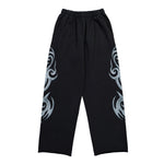 VETEMENTS Graffiti Tribal Trackpants Washed Black Sweat & Track Pants MH27SP155B Detail View 1 | GATE