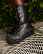 Walter Van Beirendonck Boom Boots Col. I Black Boots 10009 / Col. I Black On Model Front View | GATE
