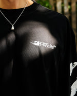 Off-White Ink Arrow 90s Skate L/S Tee Black Longsleeves OMAB09CF25JER0031001 On Model Back View | GATE
