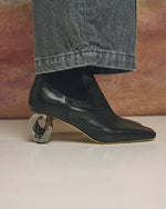JW Anderson Calf Chain Booties Black Boots BT0109-LA0232-999 On Model Front View | GATE
