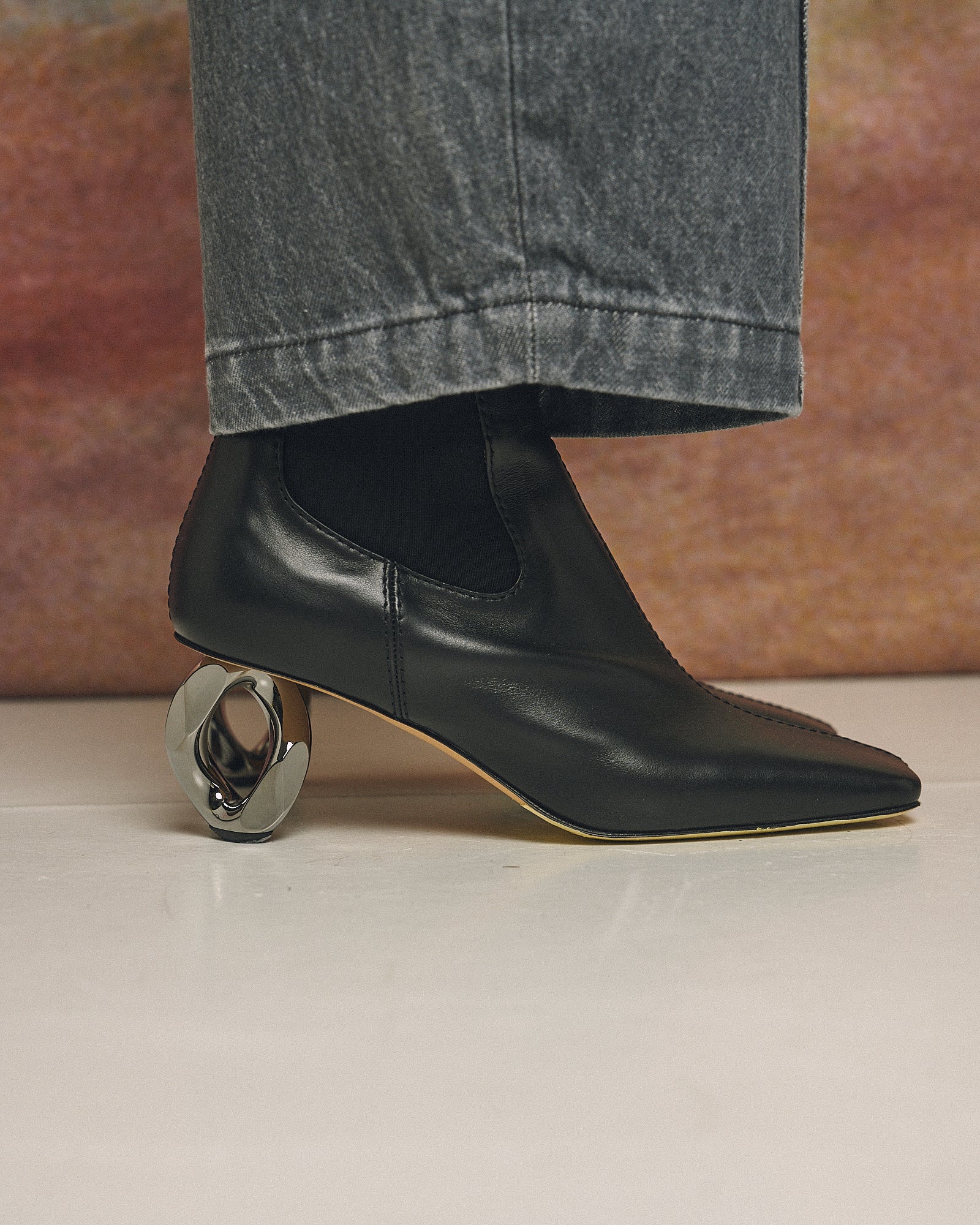 JW Anderson Calf Chain Booties Black Boots BT0109-LA0232-999 On Model Front View | GATE
