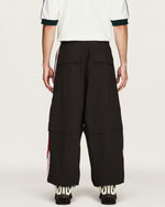 Willy Chavarria x adidas Woven Tracksuit Pant Black    Sweat & Track Pants KU7798 On Model Back View | GATE
