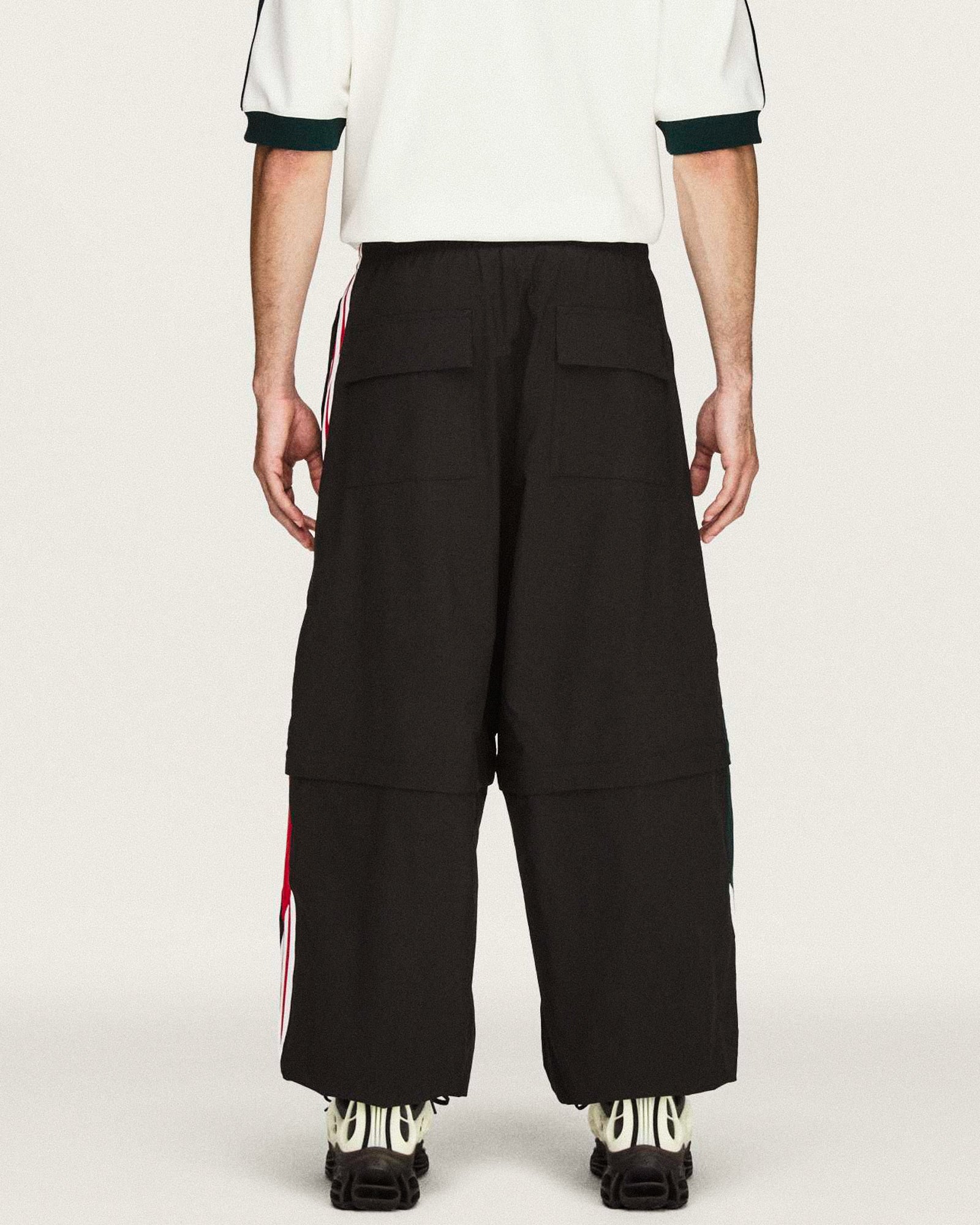 Willy Chavarria x adidas Woven Tracksuit Pant Black    Sweat & Track Pants KU7798 On Model Back View | GATE
