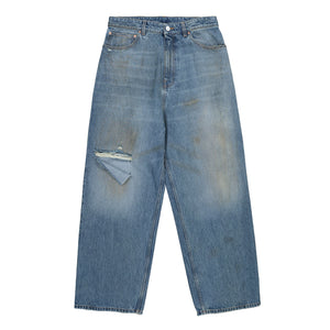 VETEMENTS Distressed Baggy Jeans Distressed Light Blue Denim UH76DP180LD Detail View 1 | GATE