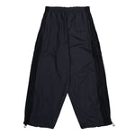 VETEMENTS 50/50 Mesh Pannel Tracksuit Pants Black Sweat & Track Pants UH76GP700B Detail View 1 | GATE
